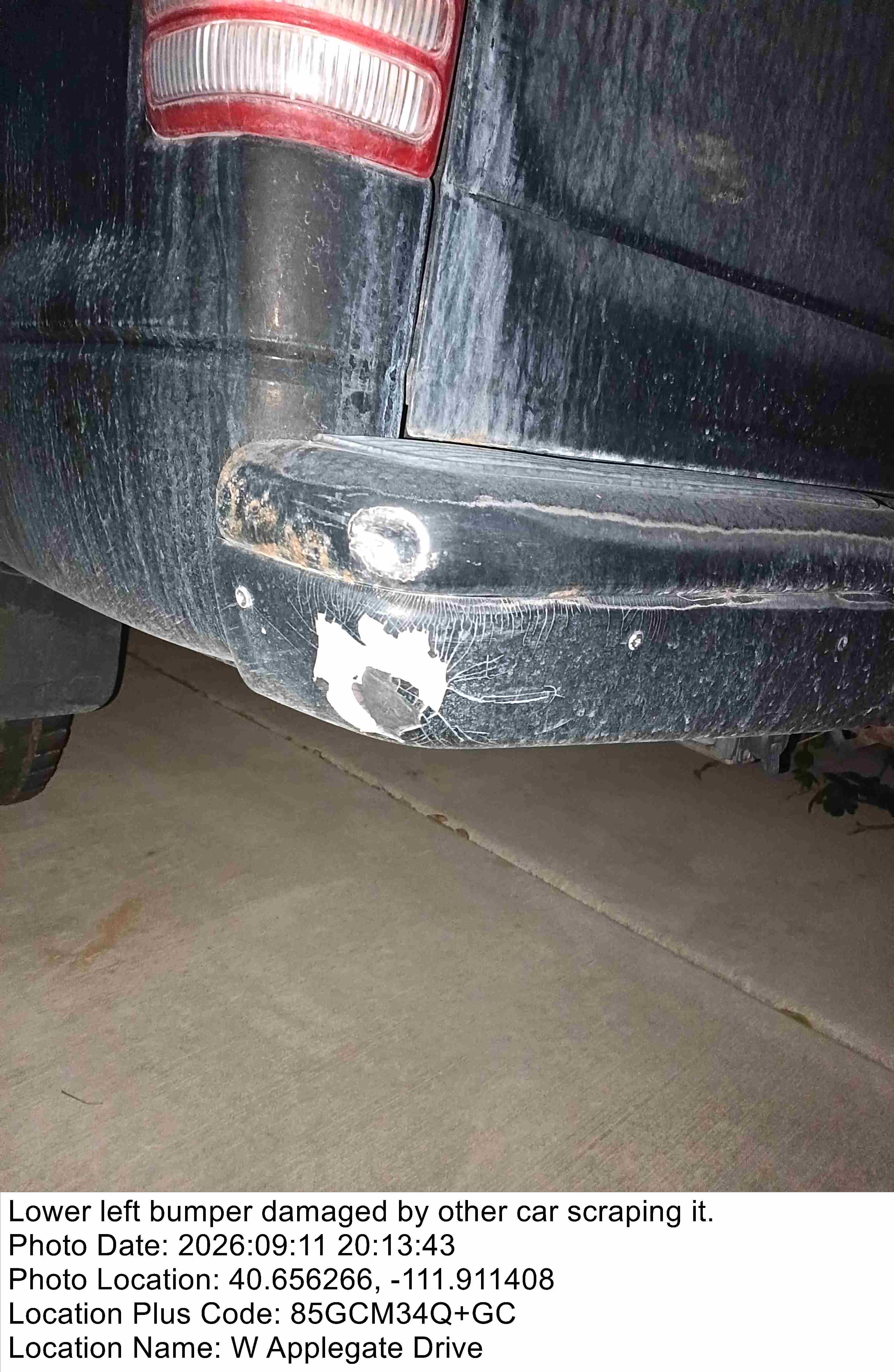 Vehicle damage photo after a caption is added